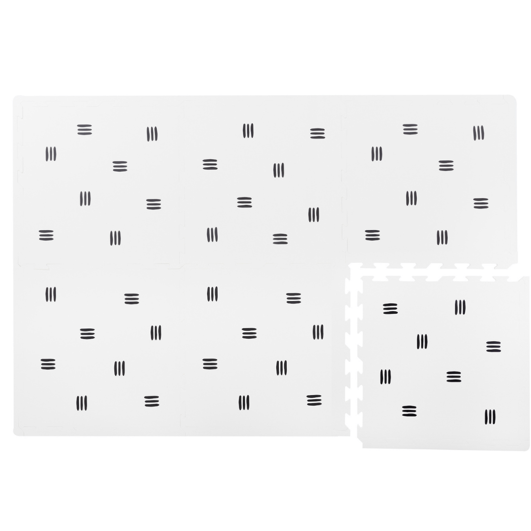 White with black stripes play mat showcasing its modular design, with one tile disconnected from the full mat from Maxie and Moo, the premier playmats in South Africa.